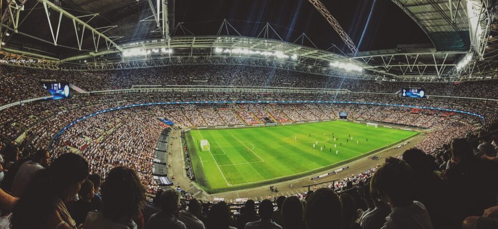 Stadio con partita di calcio