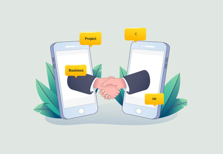 Mani che si stringono uscendo da due smartphone