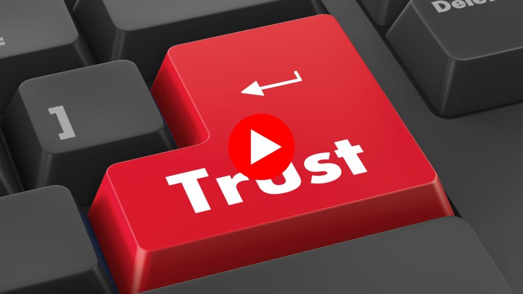 Tasto invio con scritta Trust